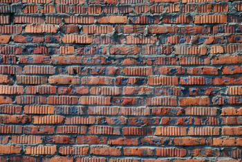 Old red brickwall as a grunge background