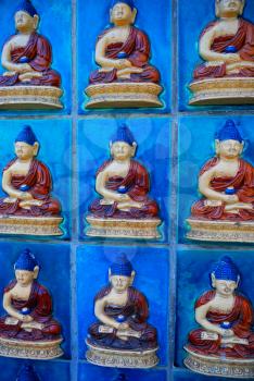 Blue wall with buddha as a background
