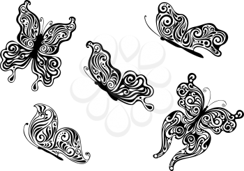 Set of ornate patterned black and white vector calligraphic butterflies with outspread wings and in profile with the wings closed