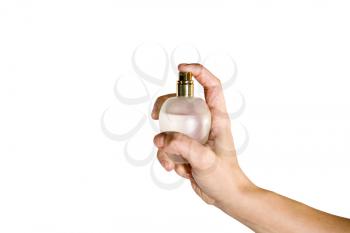 Royalty Free Photo of a Woman's Hand Spraying Perfume
