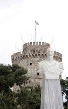 Admiral Votsis statue and The White Tower on behind in Thessaloniki, Greece