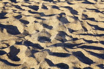 Waves of beach sand. Summer background.