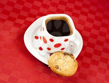 Cup of strong Turkish coffee with cookie