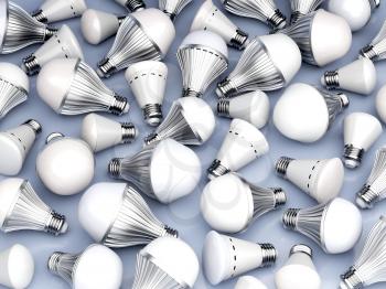 Group of different types of LED light bulbs on shiny blue background 