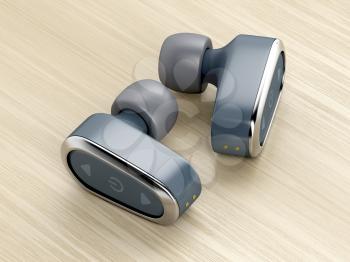 Wireless in-ear headphones on wood table