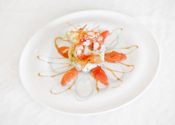 shrimp salad on a plate on a white background