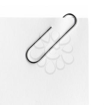Royalty Free Photo of a Note and Paperclip