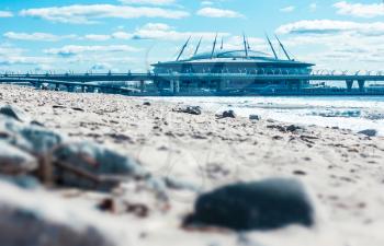SAINT-PETERSBURG, RUSSIA, APRIL 12, 2019: Zenit Arena , St. Petersburg , Krestovsky - football stadium on the background of the Gulf of Finland and the bridge