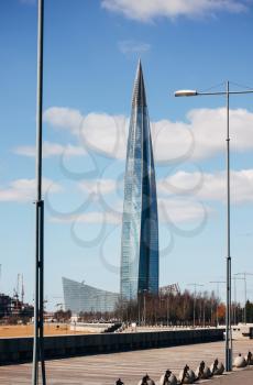 SAINT-PETERSBURG, RUSSIA, APRIL 12, 2019: Lakhta skyscraper center on the background of the park of the 300th anniversary of St. Petersburg. The tallest tower in Europe with headquarters concern Gazprom