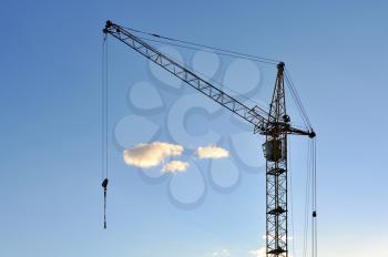 Large construction crane against the blue sky
