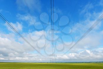 Very long wires and large power transmission poles.