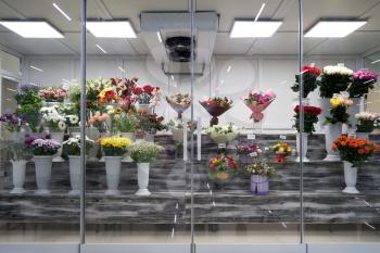 Flowers for sale in a special cold room with air conditioning.