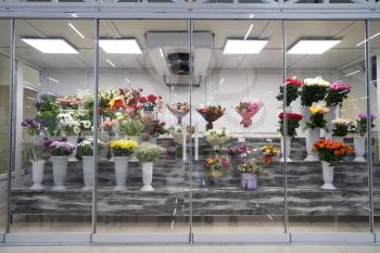 Flowers for sale in a special cold room with air conditioning.