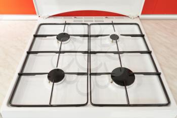 Classic white gas stove and four burners