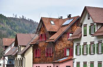 Roofs of houses from different tiles in a European village in Germany