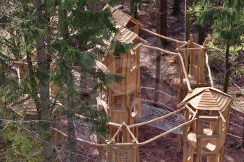 Interesting and unusual, fabulous tree house for children on a playground