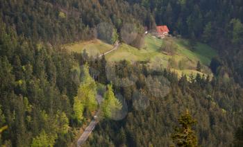Picturesque landscape of a European secluded country house in a forest of Schwarzwald