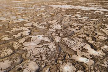 Salt pond in the dry land. Photo in Qinghai, China.