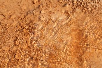 Underwater mineral with brown rock. Natural background.