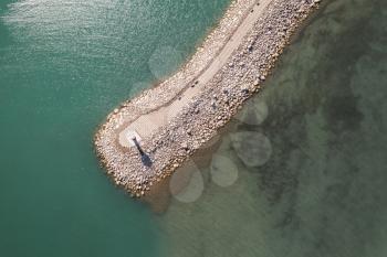 Road and lighthouses on the lake. Shot in Sayram Lake, Xinjiang, China.