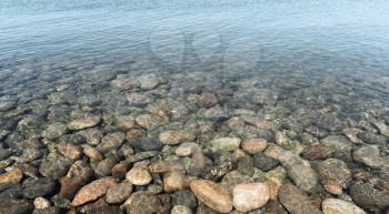 Calm surface of the lake with a sunny day. Shot in Sayram Lake, Xinjiang, China.