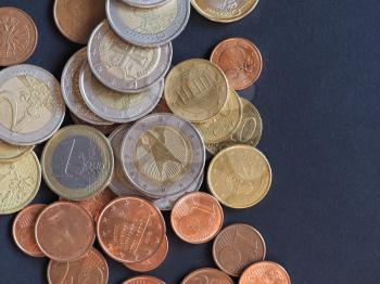 Euro coins money (EUR), currency of European Union over black background