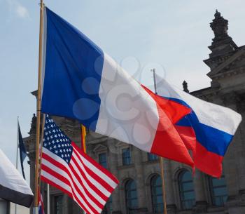 French, Russian and American flags in front of German Bundestag parliament
