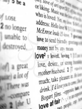 Word love written on a dictionary