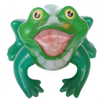 Green plastic toy frog over white background