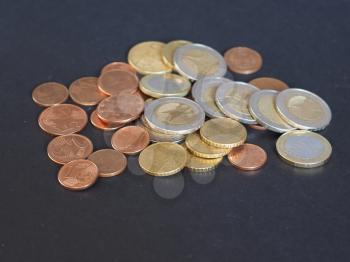 Euro coins money (EUR), currency of European Union over black background