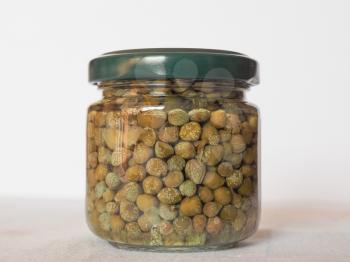 green caper (Capparis spinosa) fruit vegetarian salted food in a jar