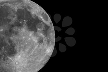 Close crop on full moon seen with an astronomical telescope with copy space