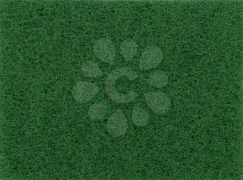 green artificial grass carpet texture useful as a background