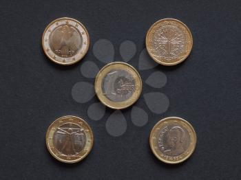 Euro coins currency from many different countries in the European Union including Germany France Italy Spain, plus the common side of the coin