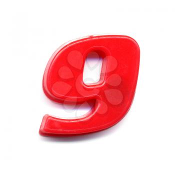 Number 9 (nine), plastic magnetic toy over white background