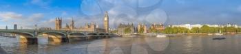 Westminster Bridge panorama with the Houses of Parliament and Big Ben in London UK