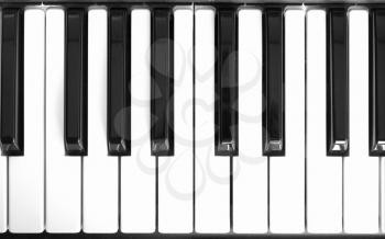 Detail of black and white keys on music keyboard