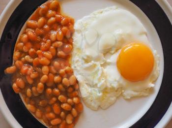 Vegetarian English breakfast with baked beans and fried egg