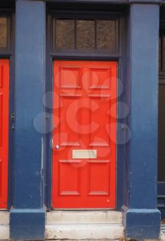 red traditional entrance door of a British house