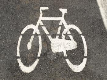 Stencil bike sign in black over white