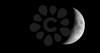 Waxing crescent moon seen with an astronomical telescope - 4K format in black and white (taken with my own telescope, no NASA images used)