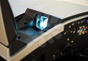 light from a digital video projector lens