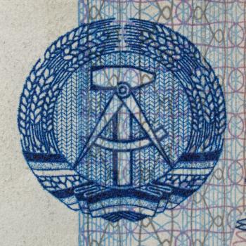 DDR symbol on a 100 Mark banknote from East Germany  - Note: no more in use since german reunification in 1989
