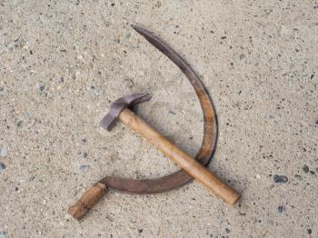 hammer and sickle symbol of communism over concrete