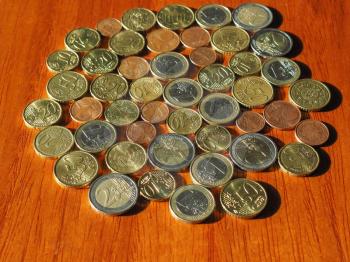 Euro coins money (EUR), currency of European Union on wooden desk