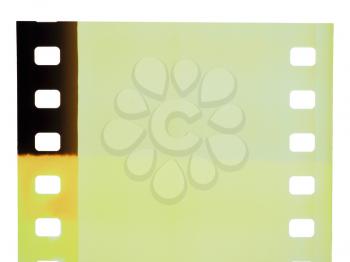 Old film once used for photography and cinema movies isolated over white