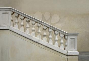 Stone baroque balaustrade as a staircase handrail