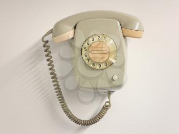 A vintage landline telephone with rotary dial