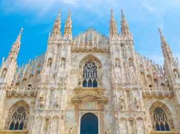 Duomo di Milano meaning Milan Cathedral in Italy, with blue sky
