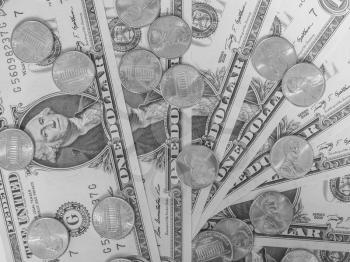One cent coins and One Dollar banknotes  currency of the United States useful as a background in black and white